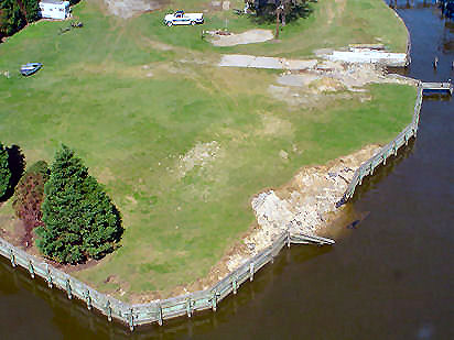 Bulkhead failure and fastland scour associated with storm surge ebb. Chesapeake Bay, BaltimoreCo. [11]